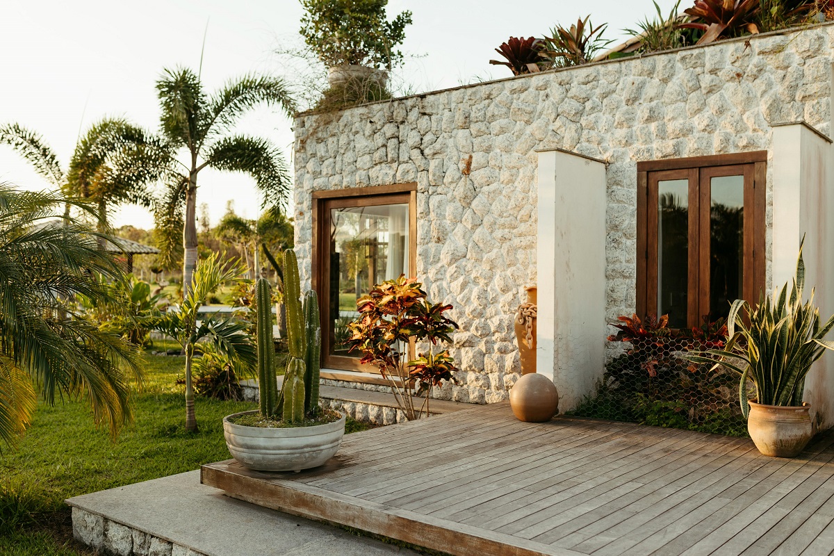 wooden deck extending from a Mexican-style home